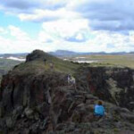 Hiking Devil's Causeway's narrow trail near Yampa, CO